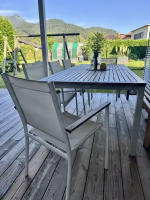 Set aus rechteckigem ausziehbarem Tisch 215-320x100 cm und 6 Gartenstühle stapelbar Bild 2