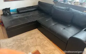Schwarzes Ecksofa mit Schlaffunktion & Stauraum
