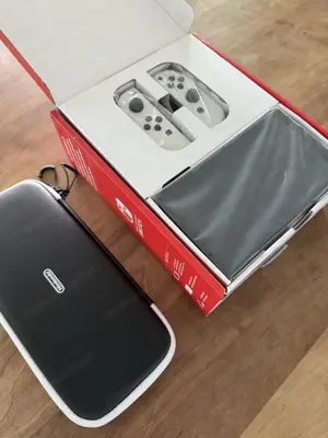 Switch OLED mit 128GB SD Karte Hülle (neuwertiger Zustand) Bild 2