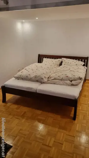 Doppelbett Echtholz braun 