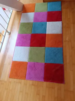 Verkaufe Teppich Bunt kariert 
