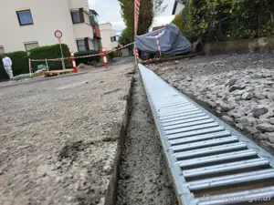 Pflasterer mit langer Berufserfahrung übernimmt  Abschrägungen Granitrandsteine bei Ein und Ausfarte