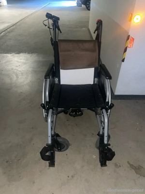 Elektrorollstuhl   Rollstuhl mit V-Drive Schiebeunterstützung   Vermeiren