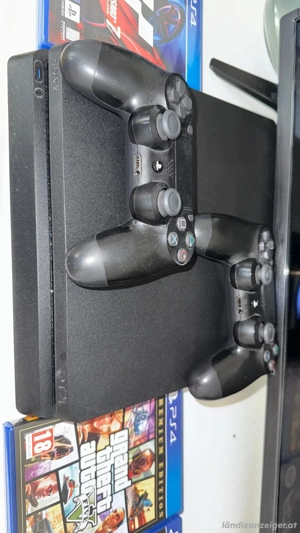Playstation 4 mit zustätzlich 4 spielen Bild 3