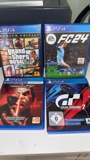 Playstation 4 mit zustätzlich 4 spielen Bild 4