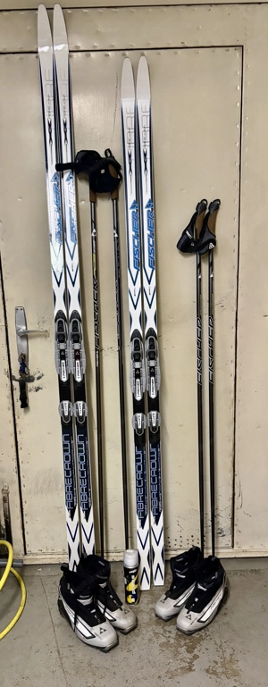 Langlaufski + Schuhe + Stöcke wie neu 