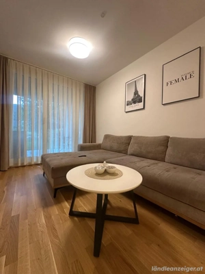 OHNE PROVISION: Sonnige 2-Zimmer-Wohnung mit Garten und Tiefgarage