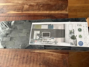 Wandverkleidung in Steinoptik