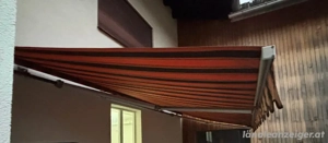 Gelenk - Markise "handbetrieben" Orange   Schwarz   2,5 x 5,5 mm Bild 4