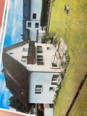 Grundstück mit Einfamilienhaus Bild 2