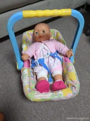 Puppe Baby in Maxi Cosi 