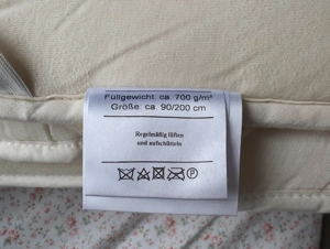 Hüslernest Schafwollunterbetten zu verschenken Bild 4