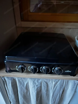 Ein neuer Gaskocher wird verkauft. 