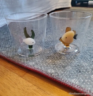 5 Gläser mit Fischen