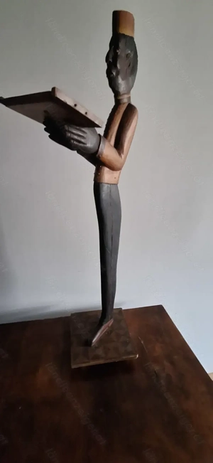 "Der stumme Diener" (Holzschnitzerei)