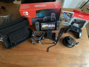 Nintendo Switch V2 inklusive Pro Controller, Micro SD Card,Tasche und ein Spiel