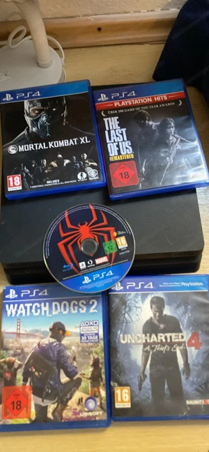 PlayStation 4 mit 1 tb Speicher Controller und 5 spielen Bild 2
