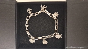 Bettelarmband mit Anhängern Silber