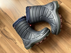 Verkaufe eine Kinderwinterjacke und -stiefel. Geeignet für Kinder von 9-10 Jahren. Guter Zustand. Bild 4
