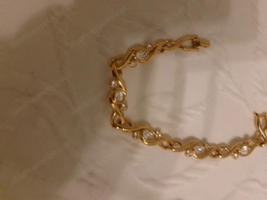 Armband goldfarben mit weißen Steinen 