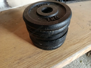 Hantelstange & 6 Crane Gewichtscheiben a 7Kg Bild 2