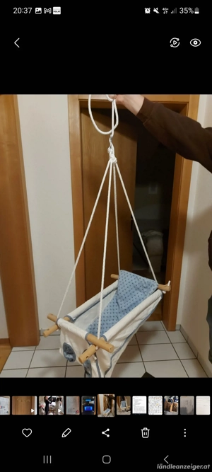 Babyschaukel aus Holz, wie neu