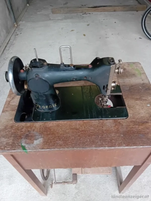 Alte Phönix mit Tisch Bild 2