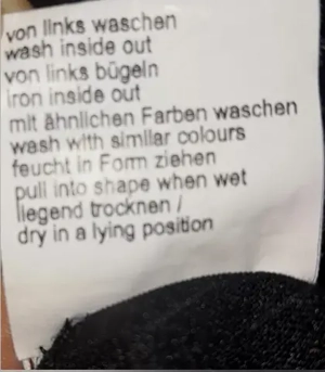 schwarzer 2-lagiger Lochpullover Gr. 40 mit Kapuze