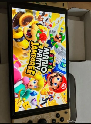 Nintendo Switch OLED mit Viele Spielen Bild 5