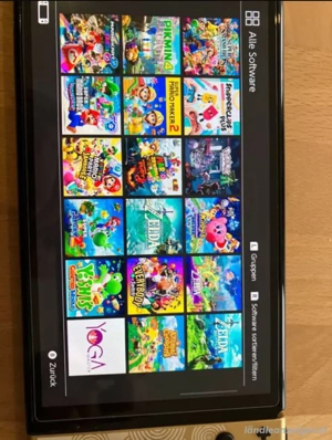 Nintendo Switch OLED mit Viele Spielen Bild 3