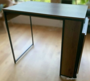 Tisch mit Klappfunktion u. Stauraum Bild 4