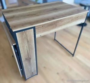 Tisch mit Klappfunktion u. Stauraum Bild 2