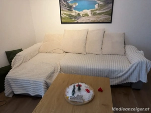 Ecksofa mit Schlaffunktion und Bettkasten