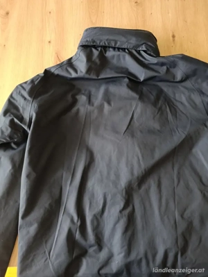 vergebe sehr schöne blaue Regenjacke  Bild 2