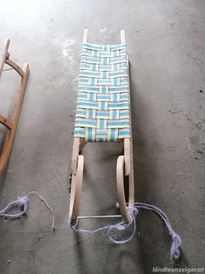 Rodel mit Kindersitz