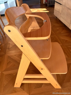 Kinderhochstuhl und Tischauflage
