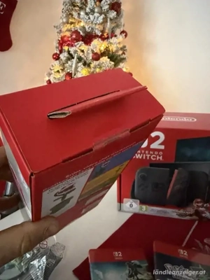 Nintendo Switch 2 mit Mega Bundle wie nue  Bild 3