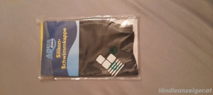 Zu Verkaufen, Badehauben 