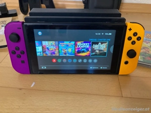 Nintendo Switch mit Spielen und Zubehör Bild 3