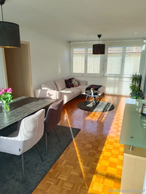 4,5 Zimmer Wohnung zu verkaufen mit Blick an den Baggersee  Bild 3