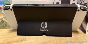 Nintendo Switch OLED-Modell, Weiß, Inkl. 4 Joy Cons, 2 Spiele, 256GB und mehr.. Bild 3