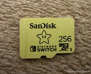 Nintendo Switch OLED-Modell, Weiß, Inkl. 4 Joy Cons, 2 Spiele, 256GB und mehr.. Bild 2