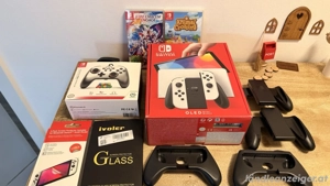 Nintendo Switch OLED-Modell, Weiß, Inkl. 4 Joy Cons, 2 Spiele, 256GB und mehr.. Bild 8