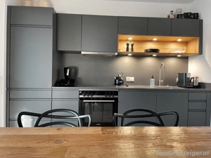 Naturnahe 2-Zimmer-Wohnung mit großzügiger Terrasse in ruhiger Wohngegend in Höchst inkl. TG, Privat Bild 2