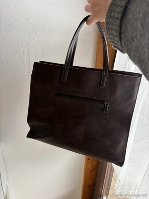 Tasche abzugeben