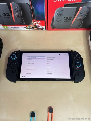 Nintendo Switch 2 OVP neuwertig-Case+ExtraGrips Bild 3