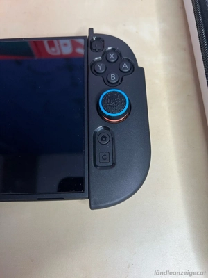 Nintendo Switch 2 OVP neuwertig-Case+ExtraGrips Bild 5