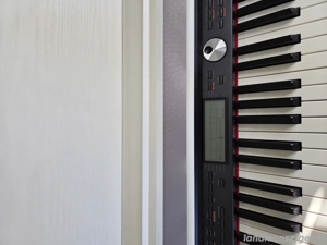 E-Piano mit Stuhl  Bild 3