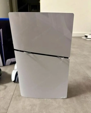 PlayStation 5 neuwertig + 2 controller + Headset + FIFA25 Bild 2