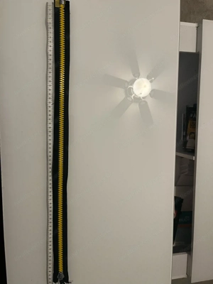 Reissverschluss schwarz  gelb 670 mm